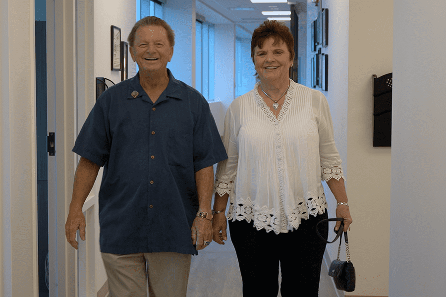 After her hip replacement surgery, patient Sharon walks painlessly through the halls of Louisville Hip and Knee Institute